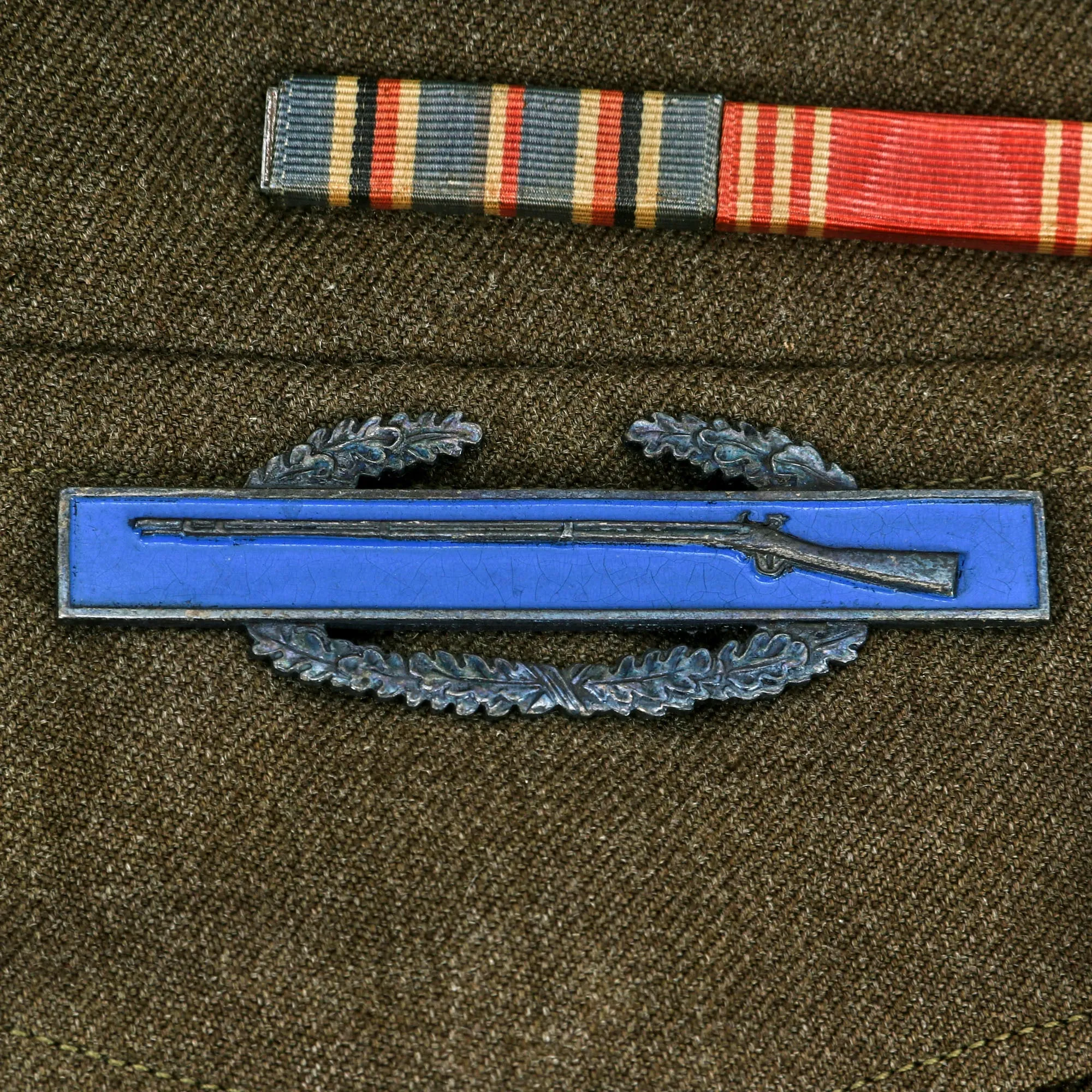 Original U.S. WWII 82nd Airborne Division, 505th Parachute Infantry Regiment Headquarters Ike Jacket Named to Private John M. Cox With Overseas Cap and Plaque