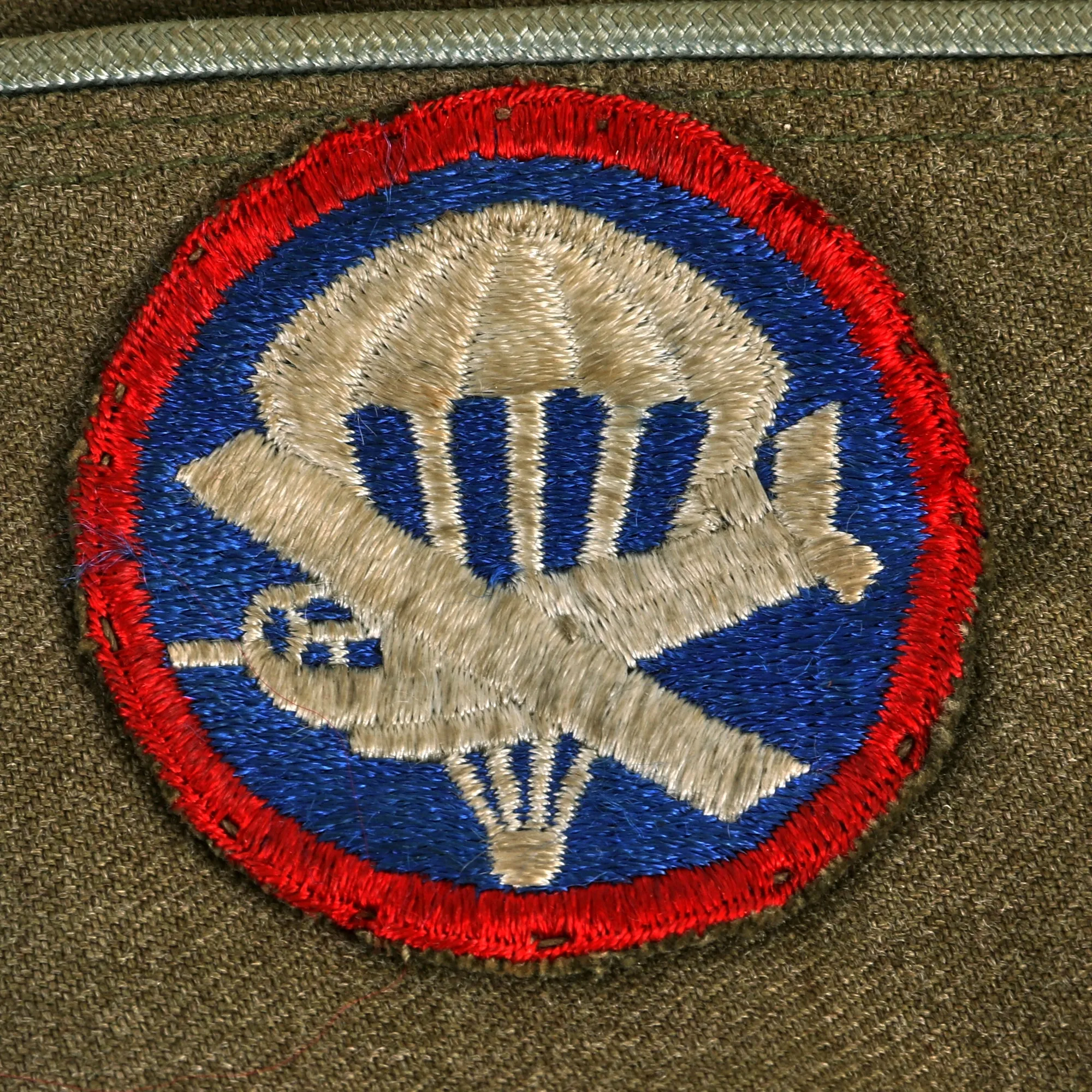 Original U.S. WWII 82nd Airborne Division, 505th Parachute Infantry Regiment Headquarters Ike Jacket Named to Private John M. Cox With Overseas Cap and Plaque